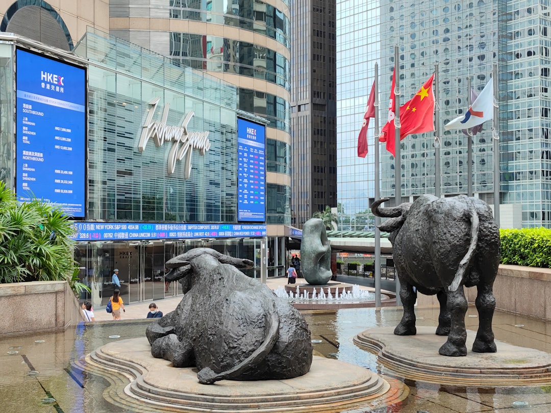 The buffalos sculptures outside the Hong Kong stock exchange market in Exchange Square. The offices of the stock exchange market is in Exchange Square, an office building complex in Central. This is a phototaking spot.